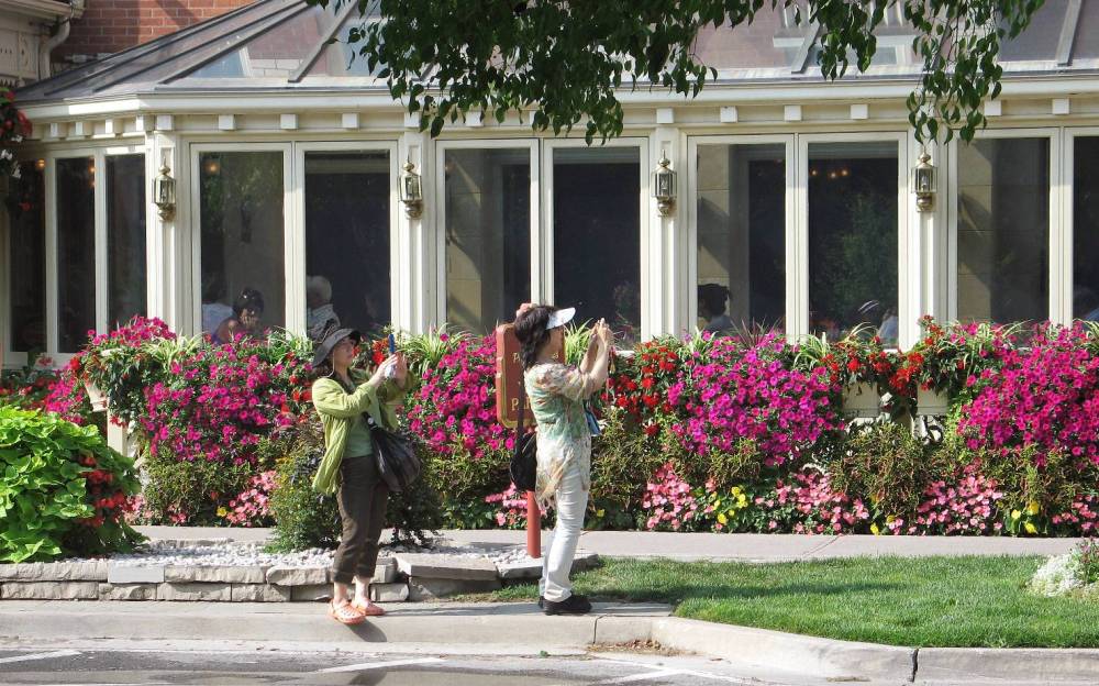NIAGARA ON THE LAKE - TWO ASIAN WOMEN TAKING A PICTURE 